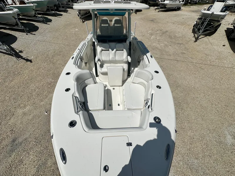 Slide: The Image of 2025 Key West 263 FS boat with spacious seating and modern design. - 13