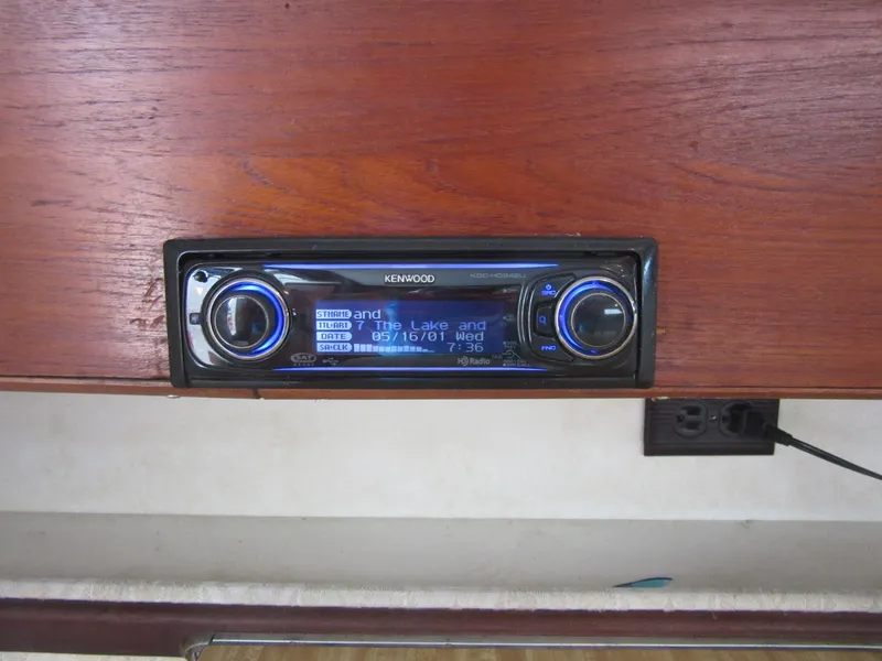 Slide: The Image of Kenwood stereo system in a 1977 Trojan F30 Express boat interior. - 29