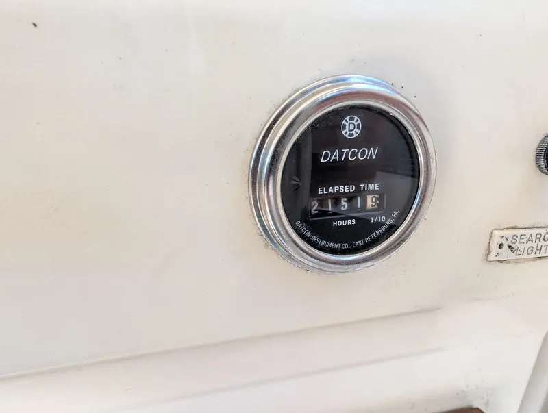 Slide: The Image of Datcon elapsed time gauge on 1977 Trojan F30 Express boat dashboard. - 37