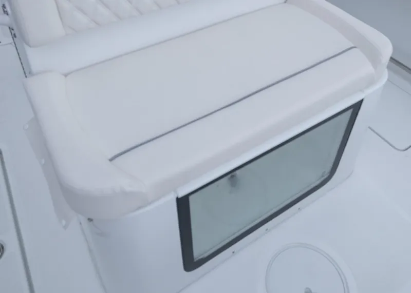 Slide: The Image of 2026 Sea Hunt Gamefish 27 Coffin Box, featuring cushioned seating and storage compartment. - 13