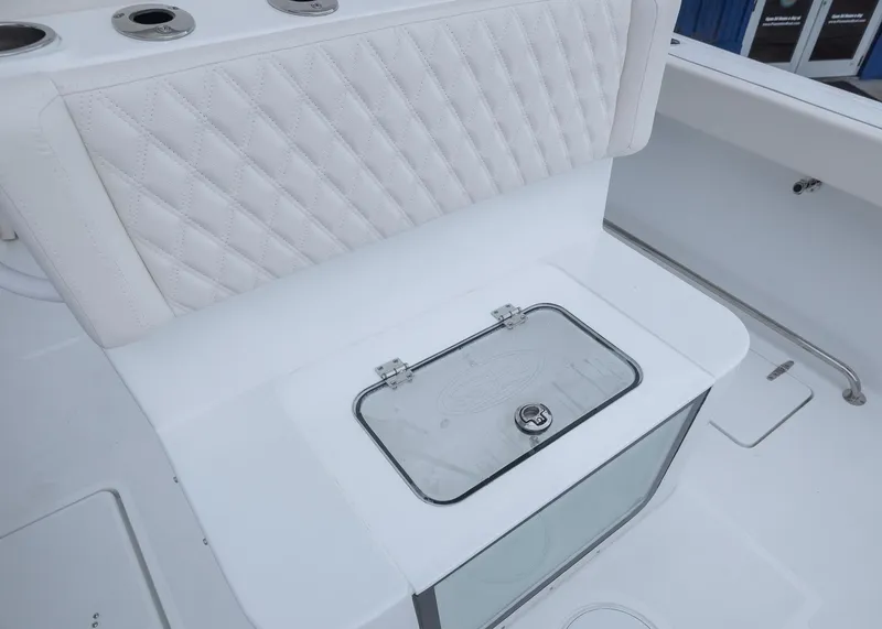 Slide: The Image of 2026 Sea Hunt Gamefish 27 Coffin Box with cushioned seating and storage compartment. - 14