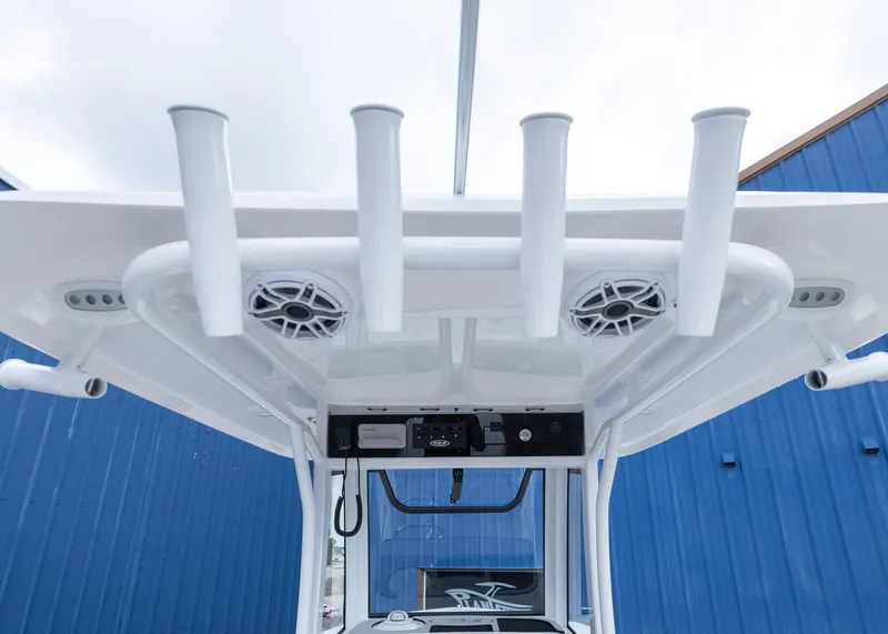 Slide: The Image of 2026 Sea Hunt Gamefish 27 Coffin Box boat with rod holders and speakers on the T-top. - 16