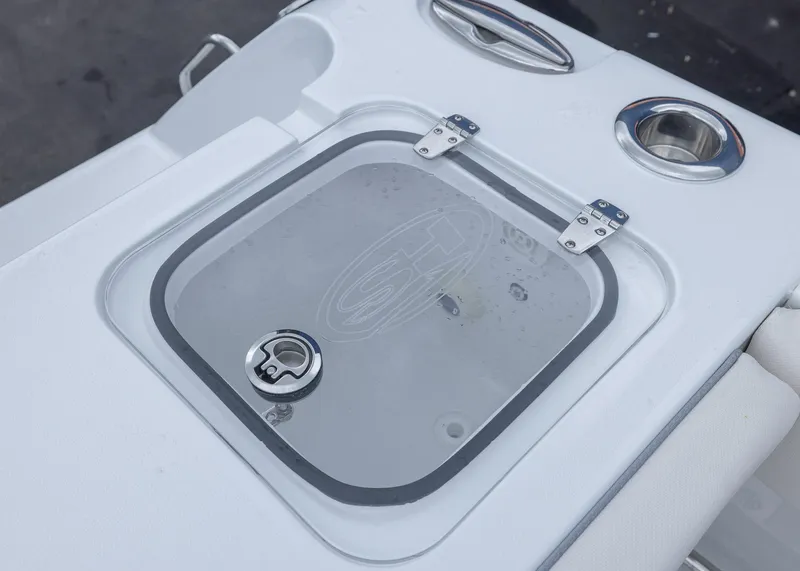 Slide: The Image of Sea Hunt Gamefish 27 Coffin Box, 2026 model, featuring a secure hatch and cup holders. - 20
