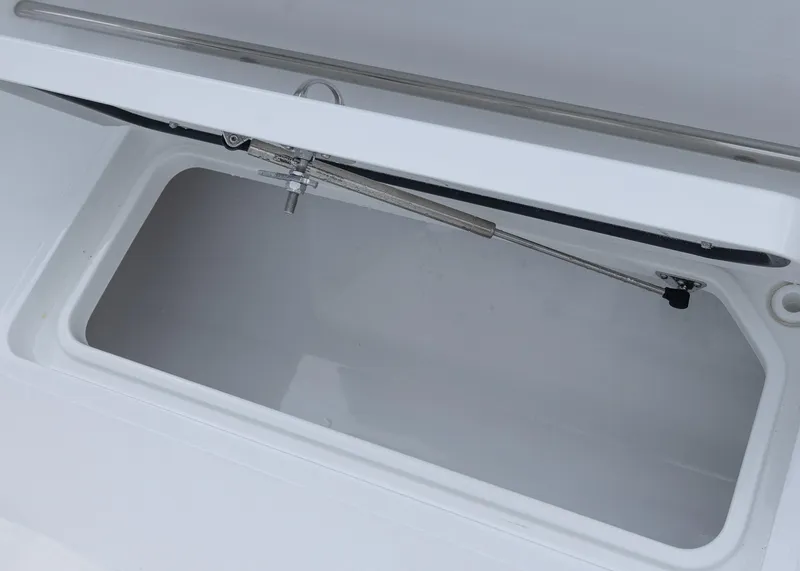Slide: The Image of Open storage compartment on 2026 Sea Hunt Gamefish 27 Coffin Box boat. - 23