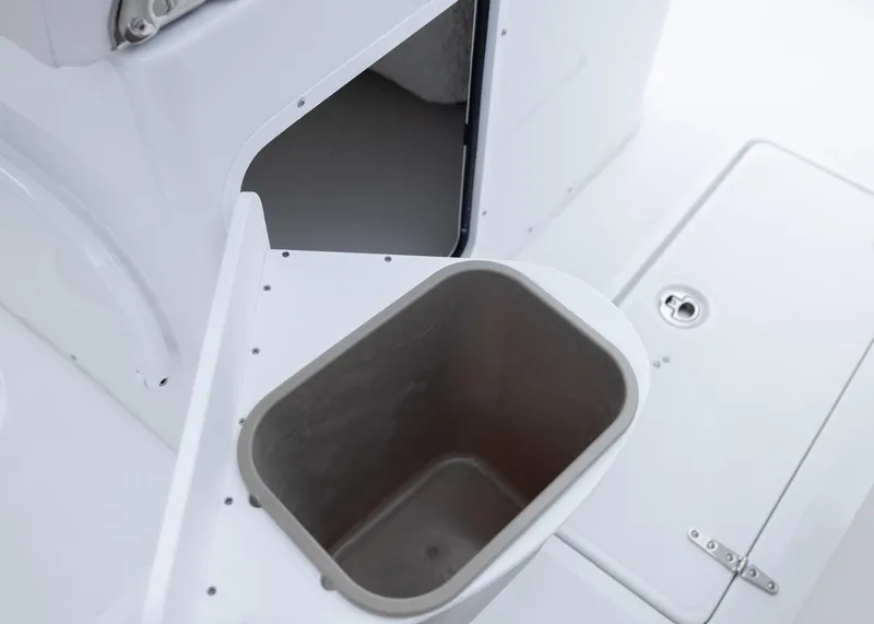 Slide: The Image of 2026 Sea Hunt Gamefish 27 Coffin Box interior storage compartment. - 25