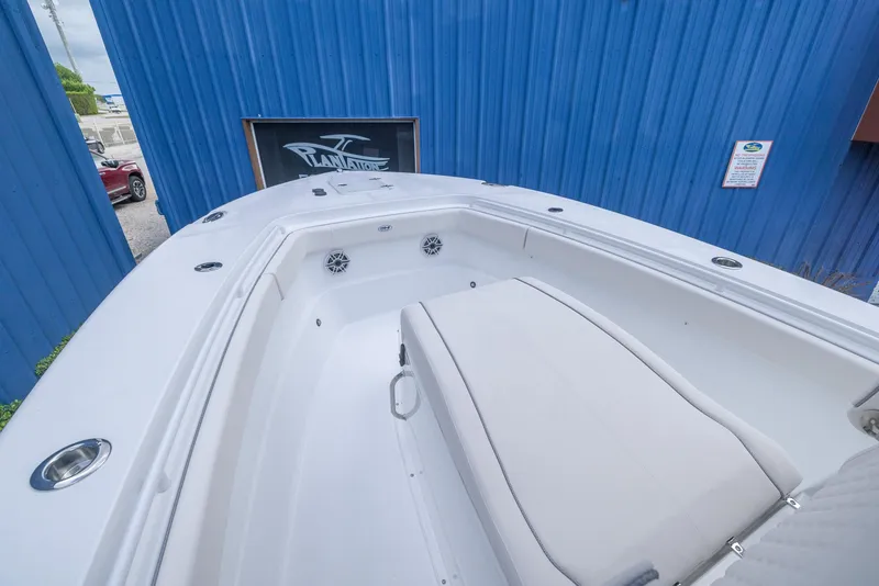Slide: The Image of 2026 Sea Hunt Gamefish 27 Coffin Box boat interior with seating and storage. - 4