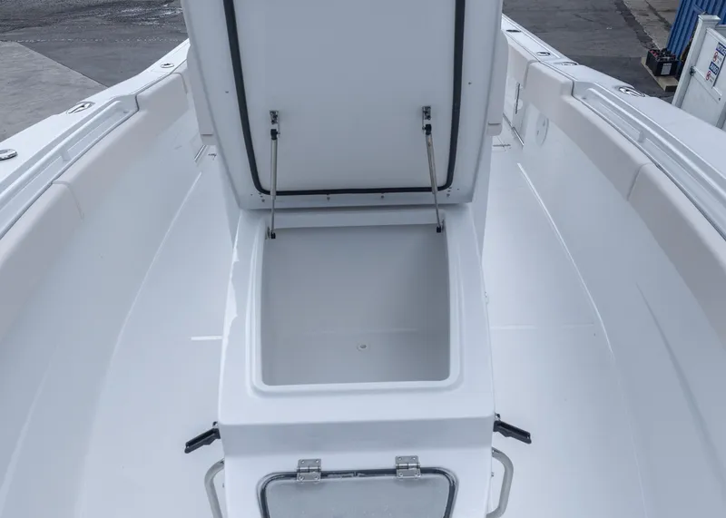 Slide: The Image of 2026 Sea Hunt Gamefish 27 Coffin Box open, showcasing spacious storage area. - 8