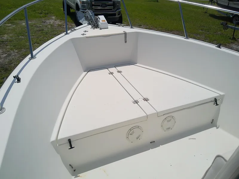 Slide: The Image of 2000 Hydra-Sports 212 Seahorse CC boat deck with storage compartments. - 15