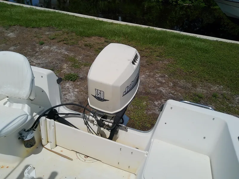 Slide: The Image of 2000 Hydra-Sports 212 Seahorse CC boat with Johnson 150 outboard motor. - 22