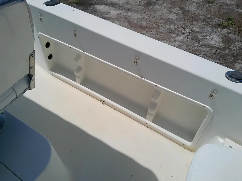 Slide: The Image of 2000 Hydra-Sports 212 Seahorse CC boat interior storage compartment. - 23