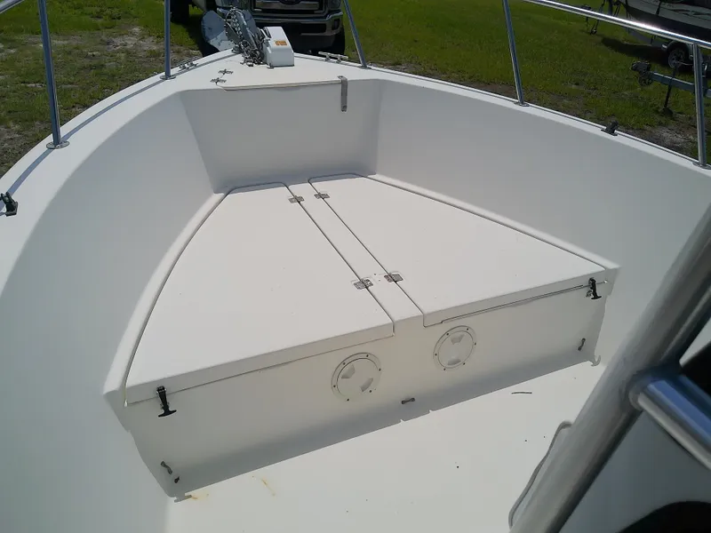 Slide: The Image of 2000 Hydra-Sports 212 Seahorse CC boat deck with storage compartments. - 26