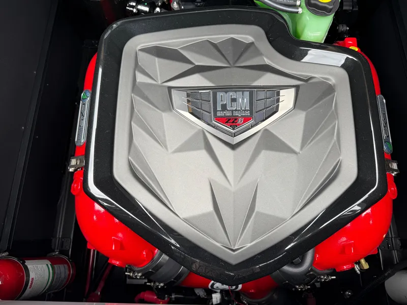 Slide: The Image of Engine of 2025 Nautique Super Air Nautique G23 with PCM branding and red accents. - 37