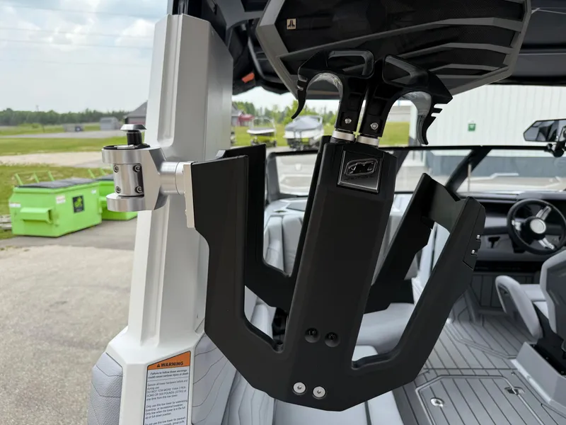 Slide: The Image of 2025 Nautique Super Air Nautique G23 wakeboard rack and interior detail. - 38