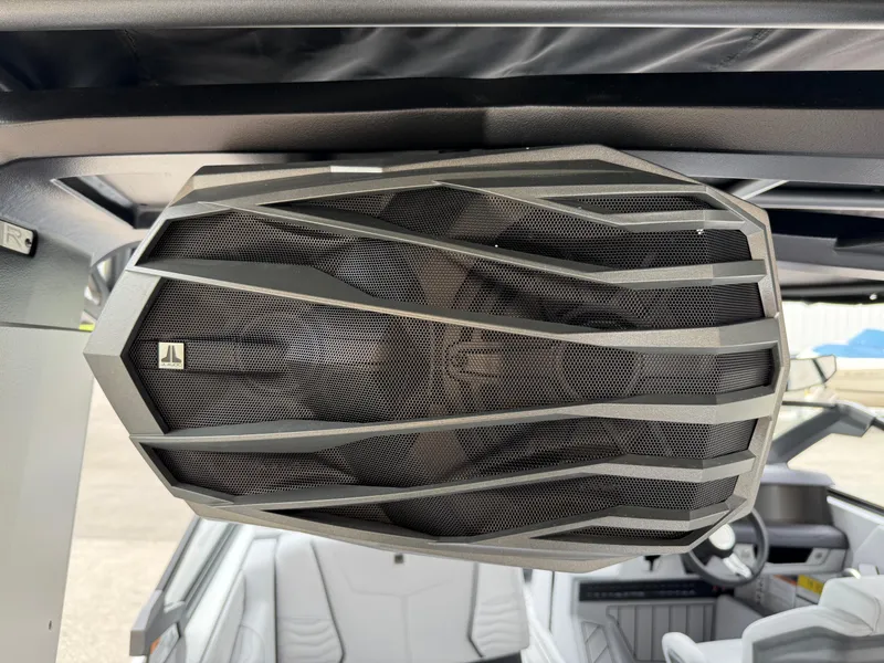 Slide: The Image of 2025 Nautique Super Air Nautique G23 boat speaker, close-up view, modern design. - 39