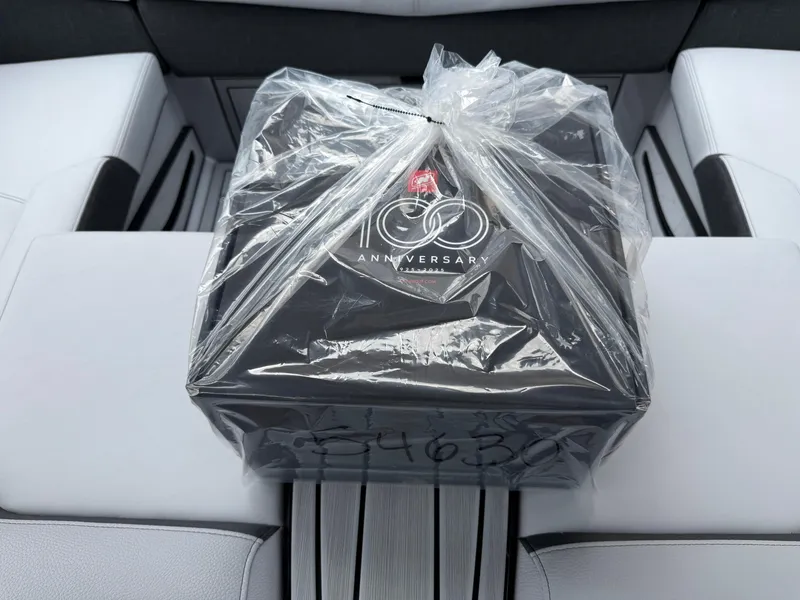 Slide: The Image of Packaged anniversary gift on 2025 Nautique Super Air Nautique G23 boat seat. - 45