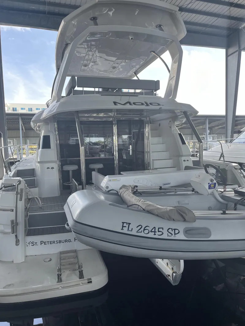 Slide: The Image of 2020 Aquila 44 Yacht with tender, docked in St. Petersburg, Florida. - 2