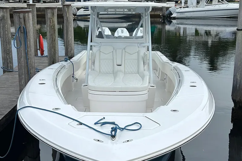 Slide: The Image of 2023 Invincible 36 Open Fisherman boat docked at marina. - 3