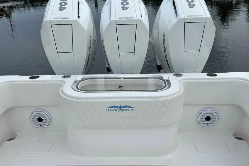 Slide: The Image of 2023 Invincible 36 Open Fisherman with triple Mercury 400 engines on calm water. - 5