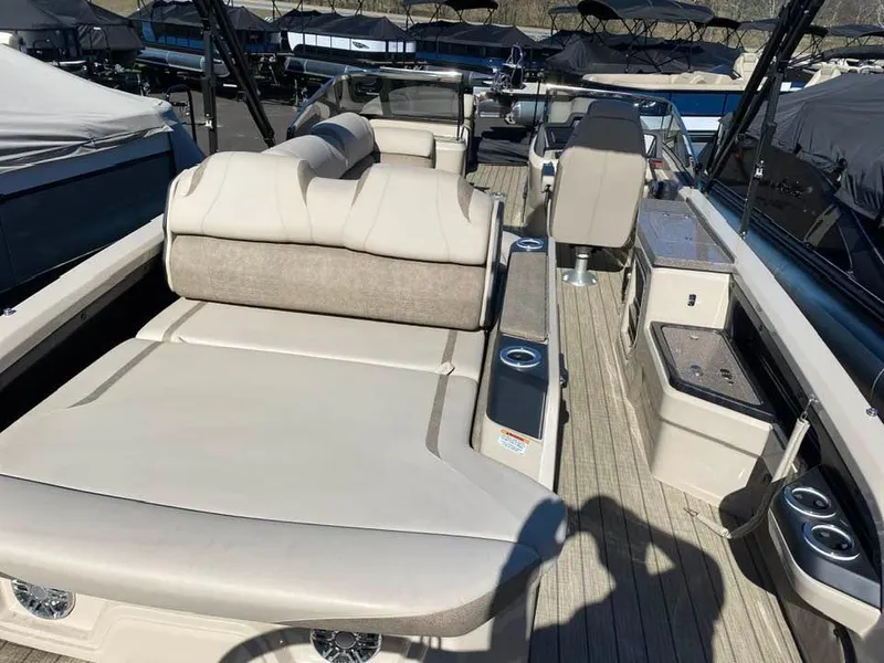 Slide: The Image of 2023 Avalon Catalina 2585 VRBW boat interior with luxurious seating and modern amenities. - 5