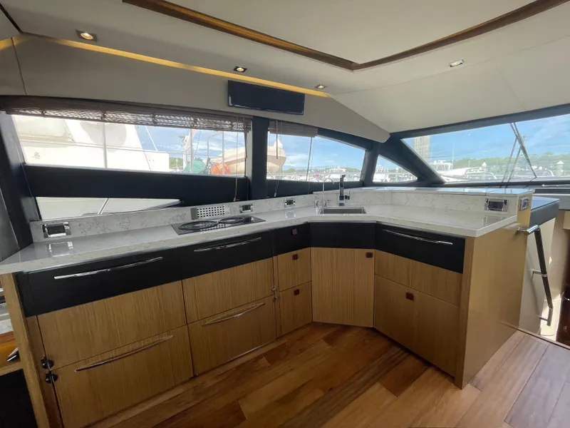 Slide: The Image of Luxurious kitchen interior of 2017 Sea Ray L590 Fly yacht with modern design. - 11