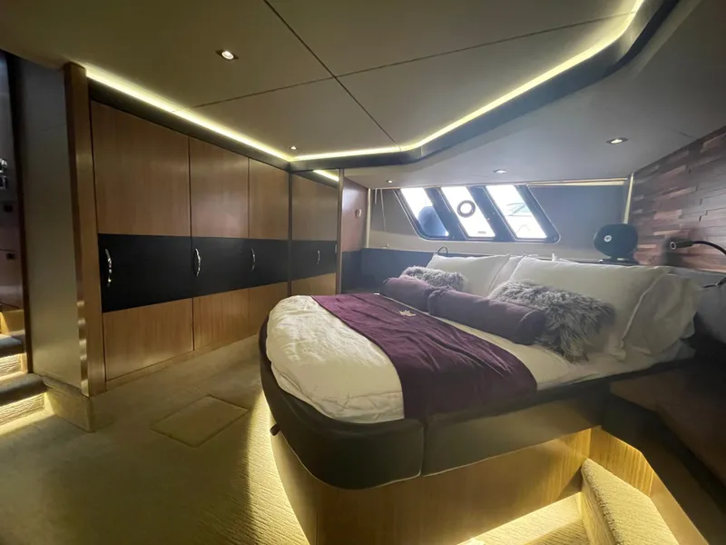 Slide: The Image of Luxurious 2017 Sea Ray L590 Fly yacht bedroom with modern design and ambient lighting. - 26
