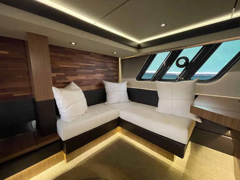 Slide: The Image of Luxurious interior of 2017 Sea Ray L590 Fly yacht with modern seating and ambient lighting. - 29