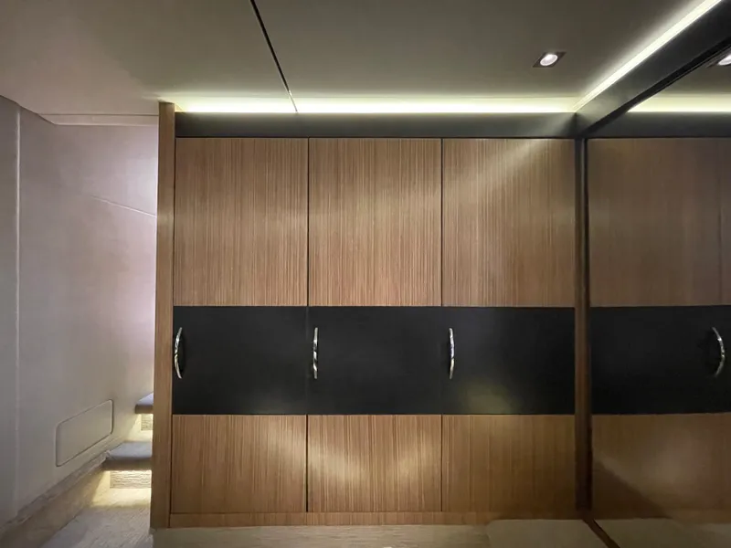 Slide: The Image of Luxurious interior of 2017 Sea Ray L590 Fly yacht with sleek wooden cabinetry. - 30