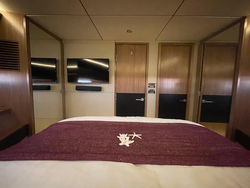 Slide: The Image of Luxurious bedroom interior of 2017 Sea Ray L590 Fly yacht with modern amenities. - 36