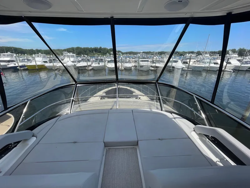 Slide: The Image of Luxurious 2017 Sea Ray L590 Fly yacht interior with marina view. - 45