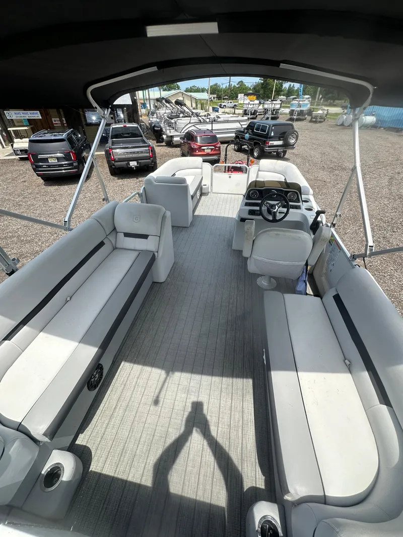 Slide: The Image of 2021 Godfrey SWEETWATER 2186 SB pontoon boat interior with seating and steering console. - 19