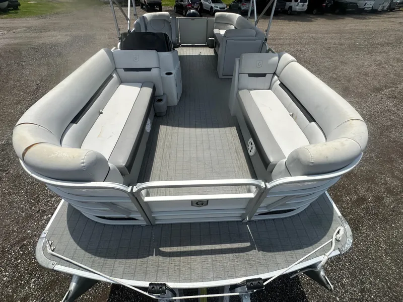 Slide: The Image of 2021 Godfrey SWEETWATER 2186 SB pontoon boat with spacious seating and gray flooring. - 9