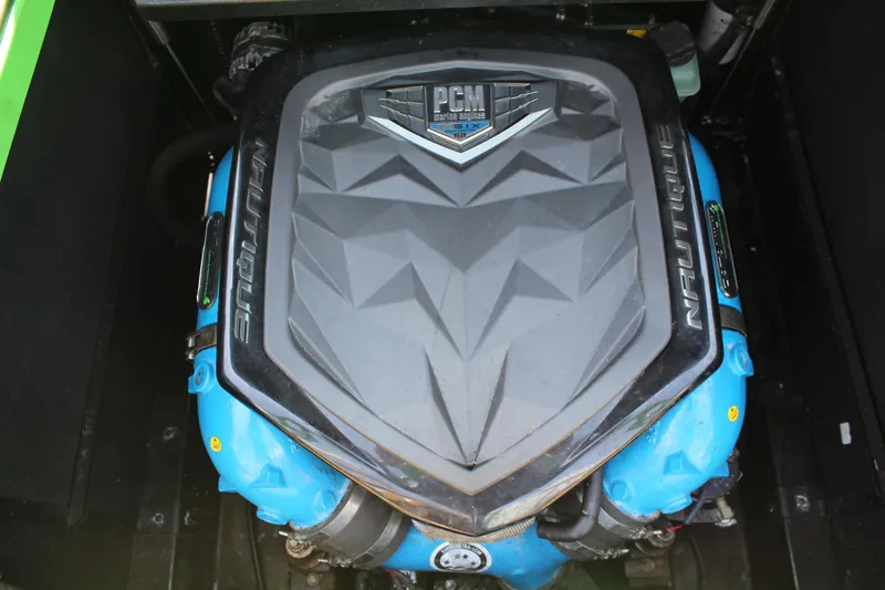 Slide: The Image of 2017 Nautique Super Air G23 engine with PCM cover, showcasing powerful marine performance. - 12