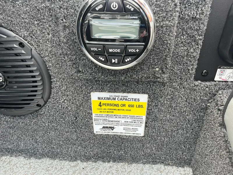 Slide: The Image of Control panel and capacity label on 2026 Lund 1775 Renegade SS boat interior. - 20