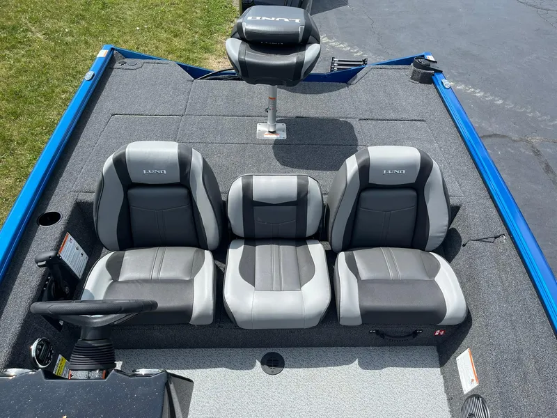 Slide: The Image of 2026 Lund 1775 Renegade SS boat interior with gray and black seating. - 7