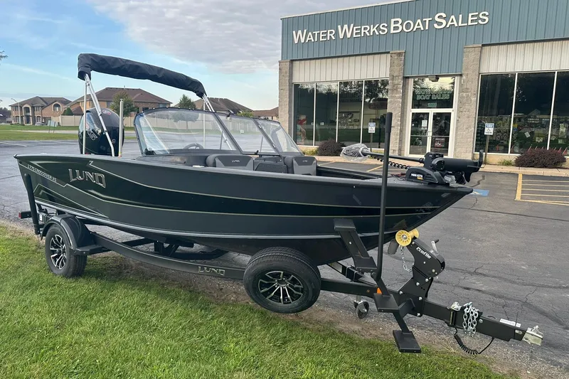 Slide: The Image of 2026 Lund 1775 Crossover XS boat on trailer at Water Werks Boat Sales. - 4