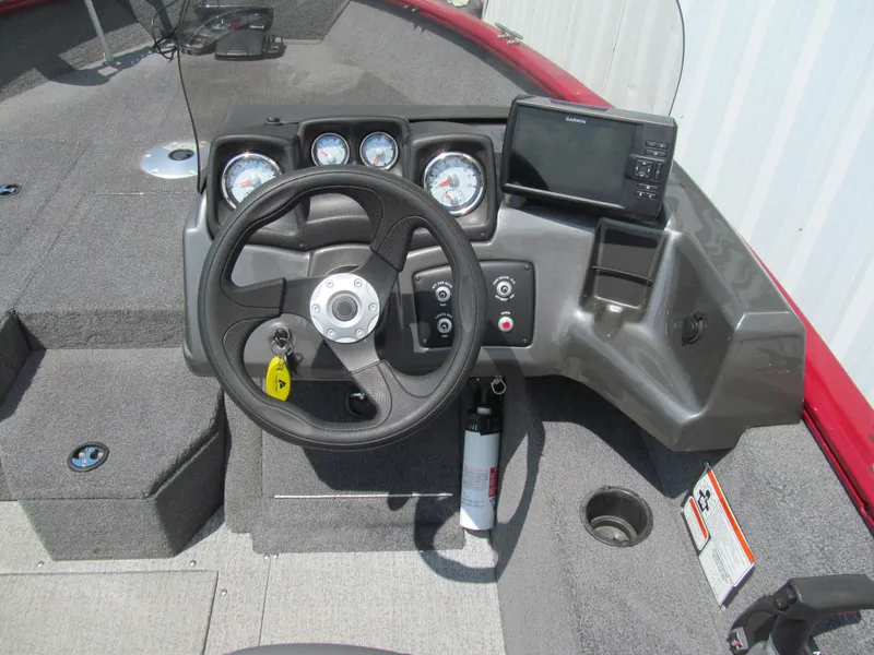 Slide: The Image of 2020 Tracker Pro Guide V-175 SC boat dashboard with steering wheel and Garmin display. - 6