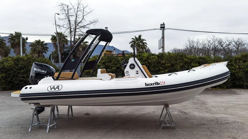 Slide: The Image of 2025 Aqvaboats luxrib 19 inflatable boat with Suzuki outboard motor. - 15