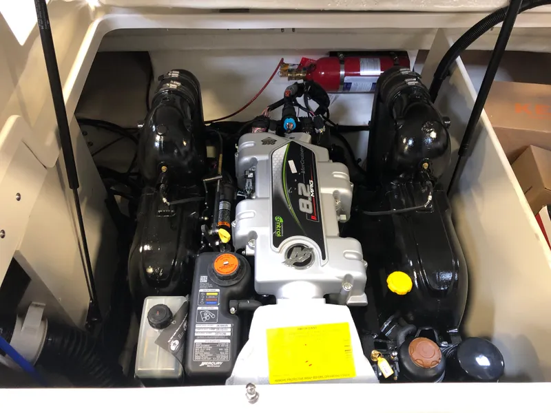 Slide: The Image of Engine compartment of 2025 Sea Ray SDX 290 boat, featuring a powerful 8.2L engine. - 15