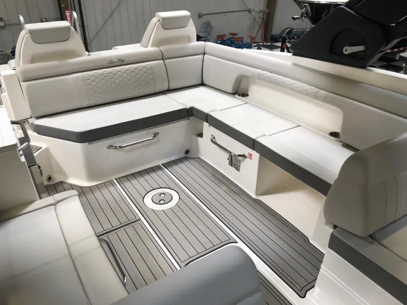 Slide: The Image of 2025 Sea Ray SDX 290 boat interior with luxurious seating and modern design. - 5