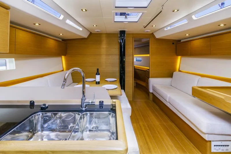 Slide: The Image of Luxurious interior of a 2017 Solaris 50 yacht with modern kitchen and seating area. - 21