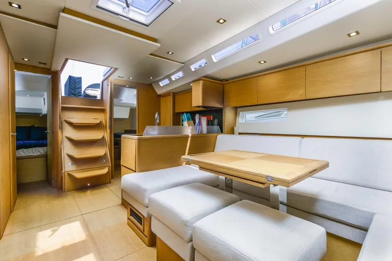 Slide: The Image of Luxurious interior of 2017 Solaris 50 yacht with modern wood finish and comfortable seating. - 24