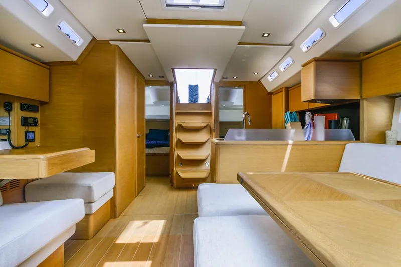 Slide: The Image of Luxurious interior of a 2017 Solaris 50 yacht with modern wood finish and ample natural light. - 25