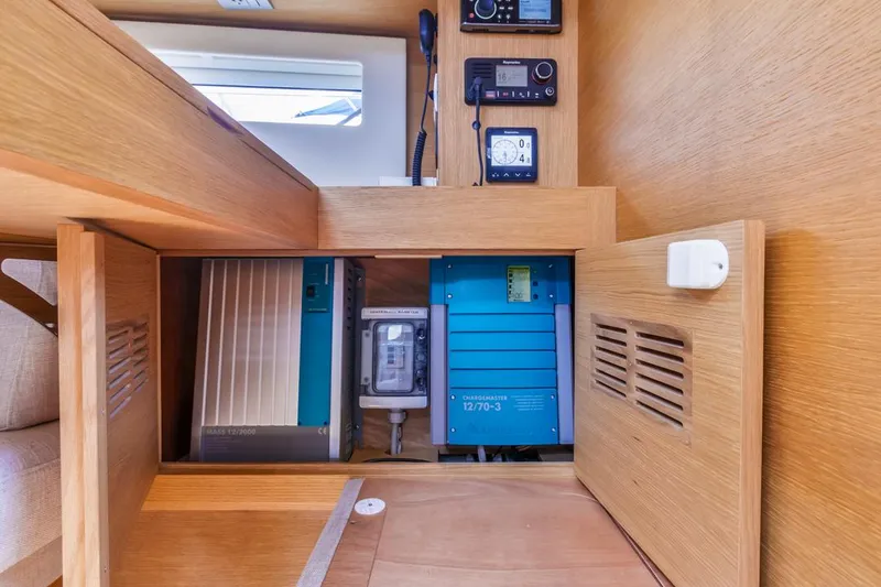 Slide: The Image of Electrical panel inside a 2017 Solaris 50 yacht, featuring navigation and power systems. - 31