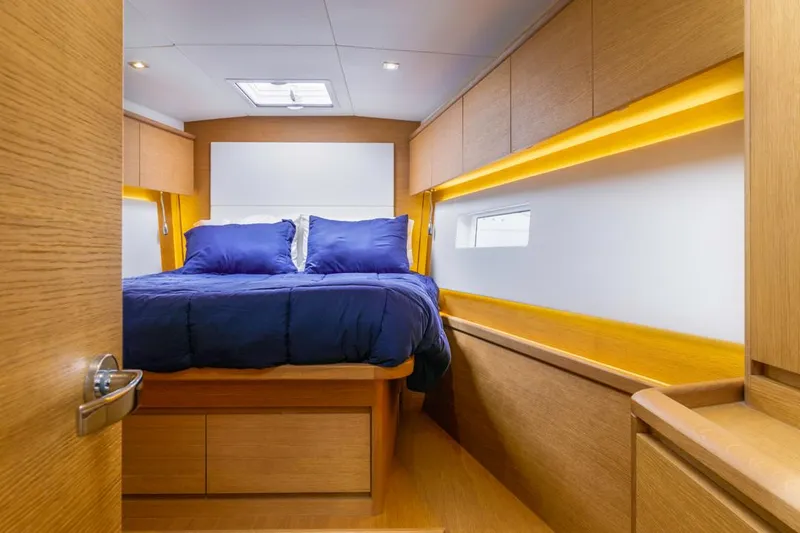 Slide: The Image of Luxurious cabin interior of 2017 Solaris 50 yacht with cozy bedding and wooden finishes. - 32