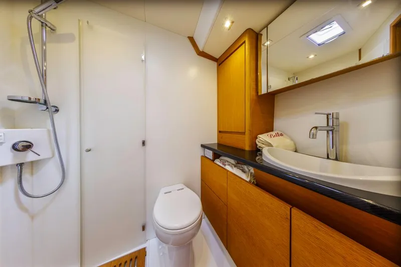 Slide: The Image of Luxurious bathroom in 2017 Solaris 50 yacht with modern fixtures and wooden cabinetry. - 35