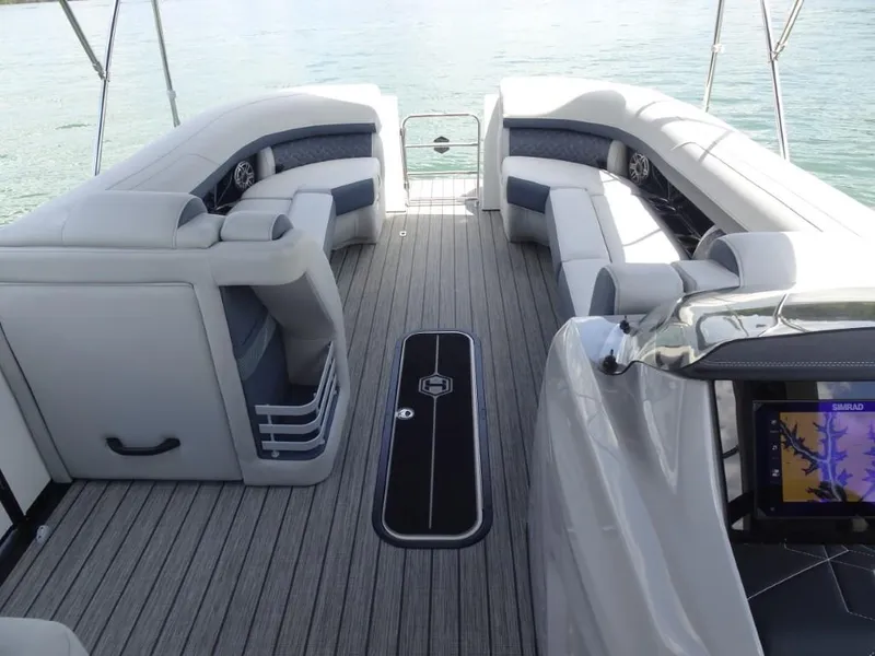 Slide: The Image of Luxurious interior of 2025 Harris Grand Mariner 250 pontoon boat with spacious seating. - 17