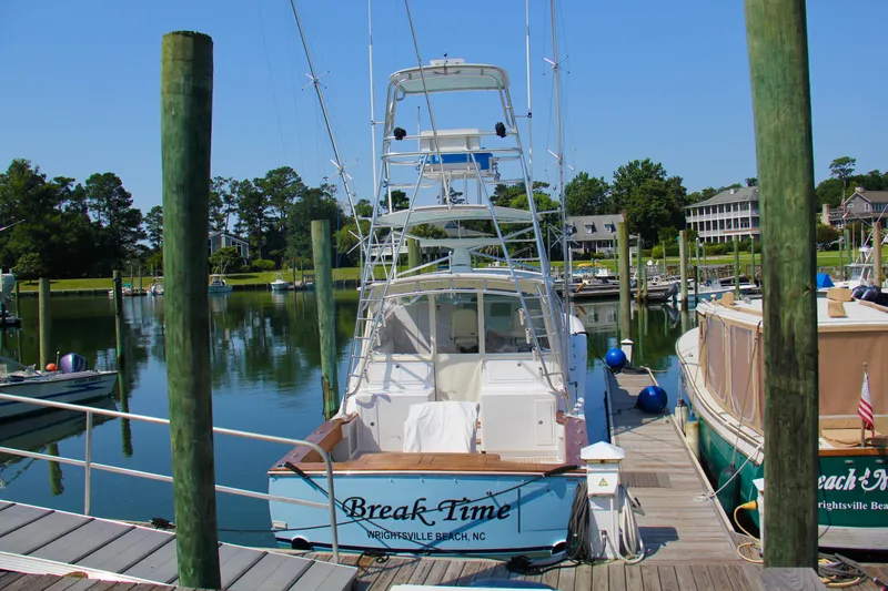Slide: The Image of 2007 Custom Carolina Layton Express boat docked at marina, Wrightsville Beach, NC. - 7