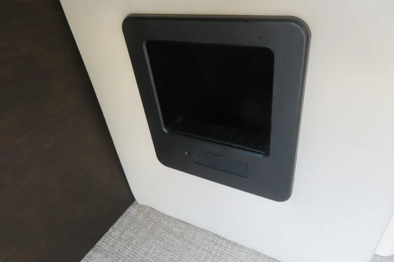 Slide: The Image of 2026 Avalon Excalibur LTD Elite Windshield boat on trailer at dealership. - 20