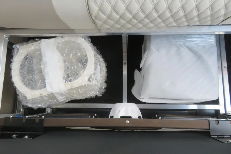 Slide: The Image of 2026 Avalon Excalibur LTD Elite Windshield logo on boat flooring. - 26