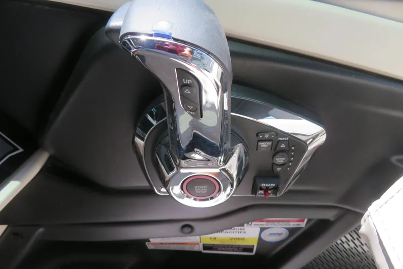 Slide: The Image of Open storage compartment with bubble-wrapped item inside, Avalon Excalibur LTD Elite Windshield 2026. - 52